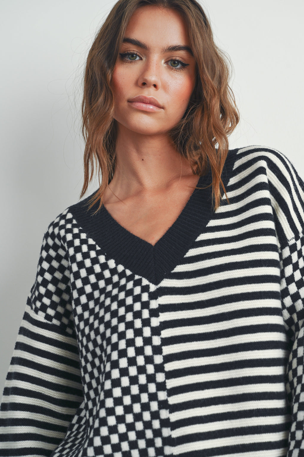 Checker V neck Cozy Sweater